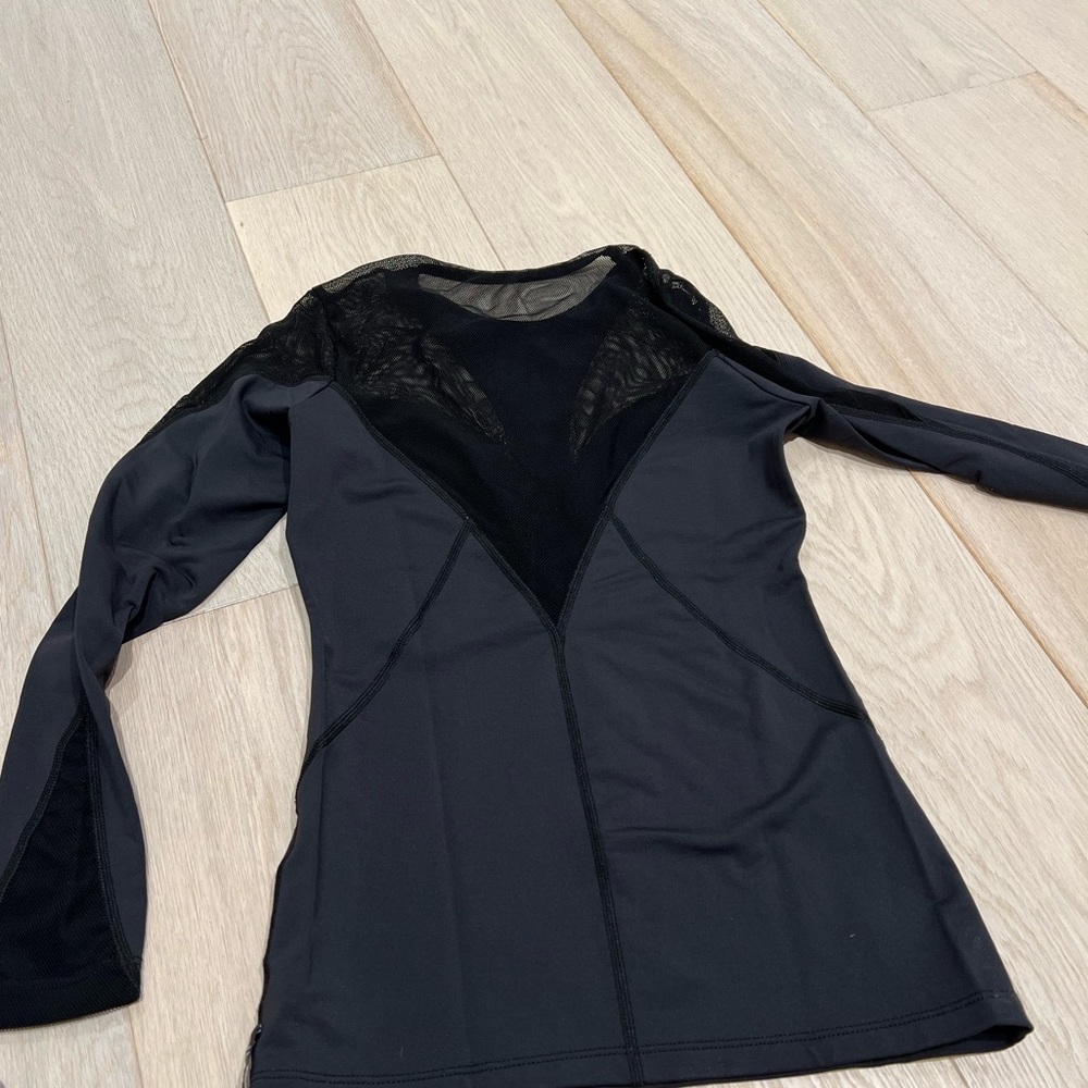 MICHI black workout top with mesh detailing